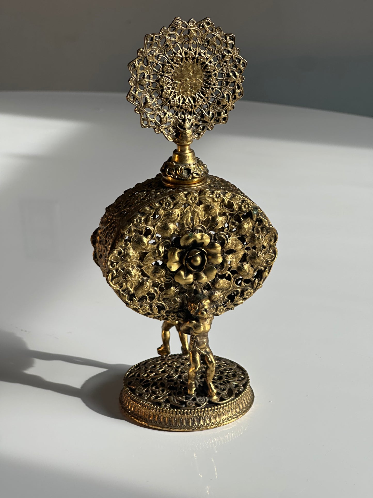 Vintage Filigree Perfume Bottle with Cherub Figures